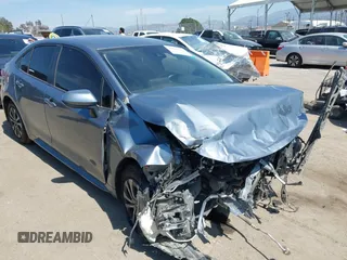 2020 Toyota Corolla Hybrid LE with VIN JTDEBRBE9LJ011672, listed as a IAAI auction lot 41832275 with 118,835 mi miles. Bid and sale history available at carsss.com. Image 16.