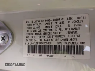 2012 Acura TSX Tech Pkg with VIN JH4CU2F67CC009658, listed as a IAAI auction lot 41849122 with 103,009 mi miles. Bid and sale history available at carsss.com. Image 9.
