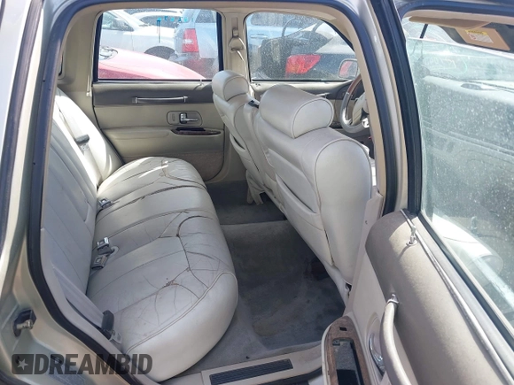 1997 Lincoln Town Car Executive z VIN 1LNLM81W6VY743706, wystawiony jako IAAI lot #41994092 z przebiegiem 265 604 mil mil oraz . Historia ofert i sprzedaży dostępna na DreamBid. Obrazek 8.