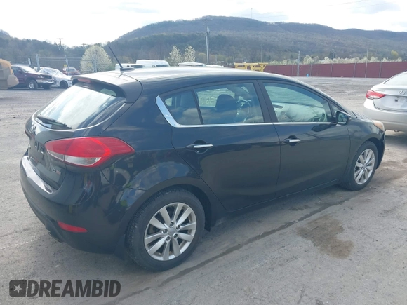 2015 Kia Forte 5-Door EX with VIN KNAFX5A87F5310145, listed as a IAAI auction lot 42031351 with 75,672 mi miles. Bid and sale history available at carsss.com. Image 4.