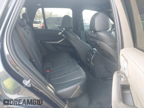 2020 BMW X5 sDrive40i with VIN 5UXCR4C06LLW64438, listed as a IAAI auction lot 41520407 with 89,868 mi miles and . Bid and sale history available at DreamBid. Image 8.