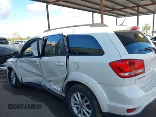2014 Dodge Journey SXT with VIN 3C4PDCBGXET122969, listed as a IAAI auction lot 41741679 with 151,285 mi miles. Bid and sale history available at carsss.com. Image 14.