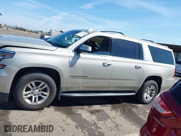 2016 Chevrolet Suburban LT with VIN 1GNSKHKC6GR423963, listed as a IAAI auction lot 42210288 with 151,799 mi miles and . Bid and sale history available at DreamBid. Image 14.
