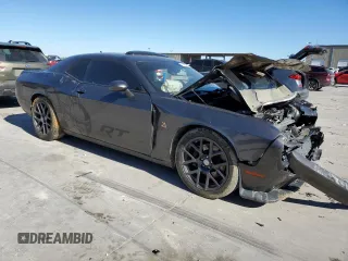 2016 Dodge Challenger 392 Hemi Scat Pack Shaker z VIN 2C3CDZFJ8GH279147, wystawiony jako Copart lot #41882095 z przebiegiem 98 874 mil mil oraz Szkoda całkowita • Salvage title. Historia ofert i sprzedaży dostępna na DreamBid. Obrazek 4.