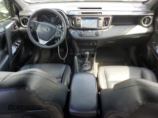 2018 Toyota RAV4 Hybrid SE with VIN JTMJJREV2JD230126, listed as a Copart auction lot 62574005 with 196,846 mi miles and Salvage title. Bid and sale history available at DreamBid. Image 8.