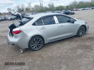 2021 Toyota Corolla SE with VIN 5YFS4MCE2MP066802, listed as a IAAI auction lot 42031552 with 34,075 mi miles. Bid and sale history available at carsss.com. Image 4.