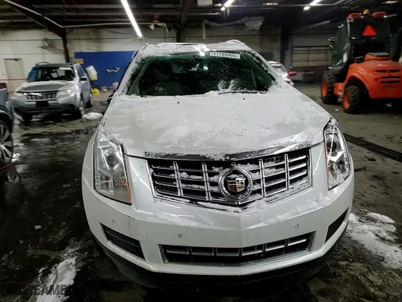 2015 Cadillac SRX Luxury Collection with VIN 3GYFNEE38FS510118, listed as a Copart auction lot 41709905 with 85,668 mi miles and Salvage Title. Bid and sale history available at carsss.com. Image 10.