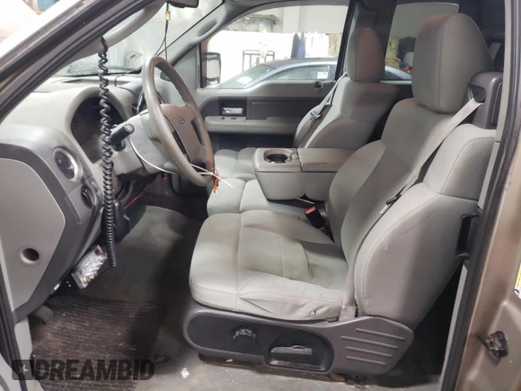 2007 Ford F-150 STX with VIN 1FTRX12W57FB26131, listed as a Copart auction lot 45450265 with 120,599 mi miles and Salvage Title. Bid and sale history available at DreamBid. Image 7.