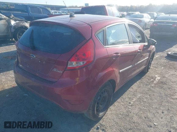 2013 Ford Fiesta SE with VIN 3FADP4EJ0DM171765, listed as a IAAI auction lot 42106666 with 149,873 mi miles and . Bid and sale history available at DreamBid. Image 4.