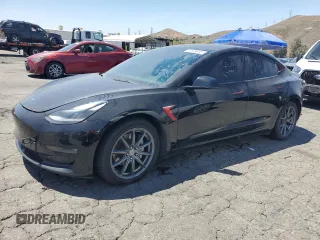 2021 Tesla Model 3 Long Range z VIN 5YJ3E1EB3MF096504, wystawiony jako Copart lot #57919615 z przebiegiem 142 854 mil mil oraz Czysty tytuł • Clean title. Historia ofert i sprzedaży dostępna na DreamBid. Obrazek 1.