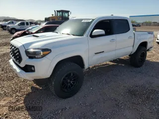 2023 Toyota Tacoma SR z VIN 3TMCZ5AN1PM533640, wystawiony jako Copart lot #56919655 z przebiegiem 26 979 mil mil oraz Szkoda całkowita • Salvage title. Historia ofert i sprzedaży dostępna na DreamBid. Obrazek 1.