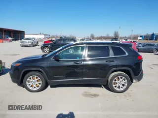 2016 Jeep Cherokee Latitude with VIN 1C4PJLCB8GW330017, listed as a IAAI auction lot 41444346 with 354,212 mi miles. Bid and sale history available at carsss.com. Image 14.