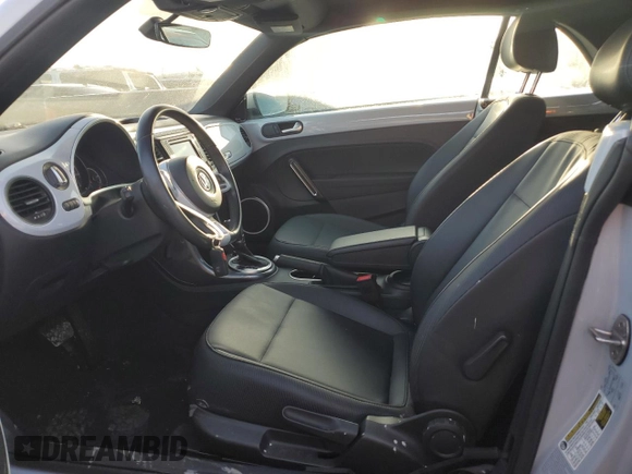 2018 Volkswagen Beetle S with VIN 3VW5DAAT7JM506557, listed as a Copart auction lot 84736194 with 34,930 mi miles and Salvage title. Bid and sale history available at DreamBid. Image 7.