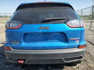 2019 Jeep Cherokee Trailhawk with VIN 1C4PJMBX9KD393862, listed as a Copart auction lot 56695905 with 64,334 mi miles and Salvage title. Bid and sale history available at DreamBid. Image 6.