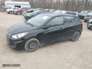 2014 Hyundai Accent GS with VIN KMHCT5AE6EU197814, listed as a IAAI auction lot 41697539 with 228,490 mi miles. Bid and sale history available at carsss.com. Image 2.