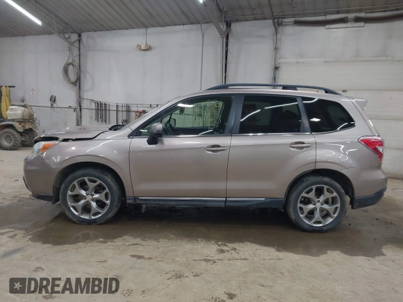 2015 Subaru Forester Touring with VIN JF2SJAUC6FH455446, listed as a IAAI auction lot 42095963 with 152,545 mi miles and . Bid and sale history available at DreamBid. Image 14.
