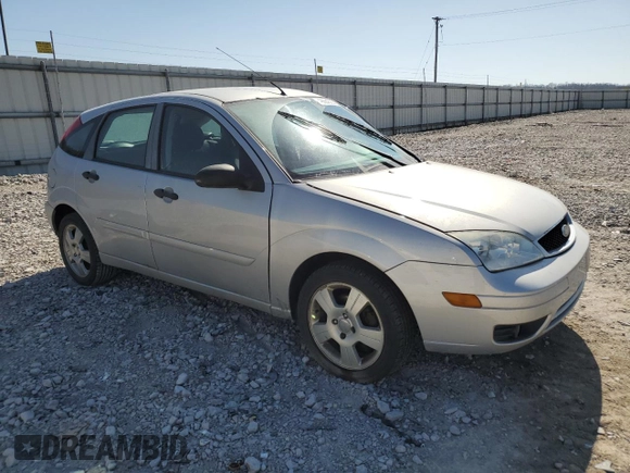2007 Ford Focus S with VIN 1FAHP37N77W342091, listed as a Copart auction lot 48664305 with 120,661 mi miles and Salvage Title. Bid and sale history available at carsss.com. Image 4.