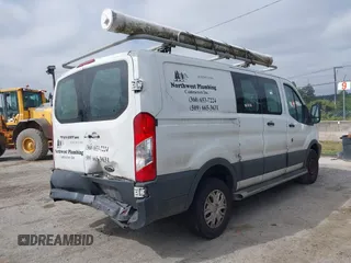 2015 Ford Transit Cargo with VIN 1FTNR1ZM6FKA34609, listed as a IAAI auction lot 42635875 with 214,750 mi miles and . Bid and sale history available at DreamBid. Image 4.