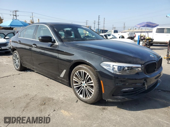 2018 BMW 5 Series 530i with VIN WBAJA5C52JWA36440, listed as a Copart auction lot 63325515 with 8,786 mi miles and Salvage title. Bid and sale history available at DreamBid. Image 4.