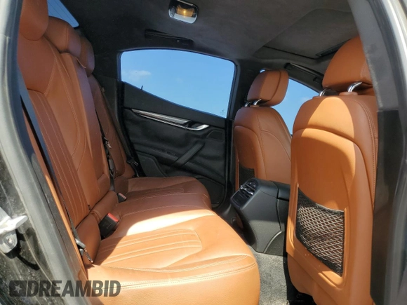 2016 Maserati Ghibli z VIN ZAM57XSAXG1174741, wystawiony jako Copart lot #51975655 z przebiegiem 127 182 mil mil oraz Tytuł czysty. Historia ofert i sprzedaży dostępna na DreamBid. Obrazek 10.