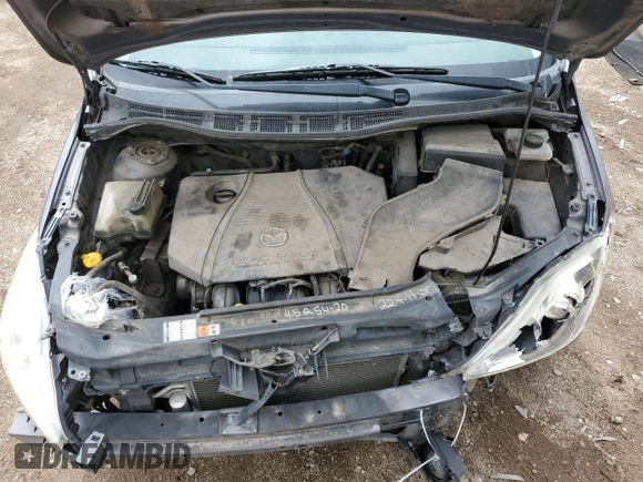 2007 Mazda 5 Touring с VIN JM1CR293170147143, выставлен на аукционе Copart как лот 55636135 с пробегом 173 466 миль миль и Списание • Salvage title. История ставок и продаж доступна на DreamBid. Изображение 12.