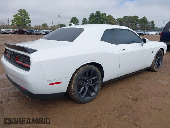 2021 Dodge Challenger GT z VIN 2C3CDZJG5MH674314, wystawiony jako IAAI lot #41593329 z przebiegiem 32 161 mil mil oraz . Historia ofert i sprzedaży dostępna na DreamBid. Obrazek 4.