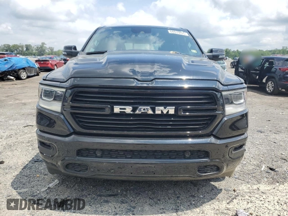 2023 Ram 1500 Laramie with VIN 1C6SRFRT1PN577199, listed as a Copart auction lot 64833895 with 22,119 mi miles and Salvage title. Bid and sale history available at DreamBid. Image 5.