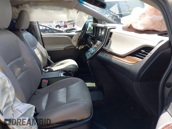 2015 Toyota Sienna XLE with VIN 5TDYK3DC5FS594514, listed as a IAAI auction lot 42183673 with 120,978 mi miles and . Bid and sale history available at DreamBid. Image 5.