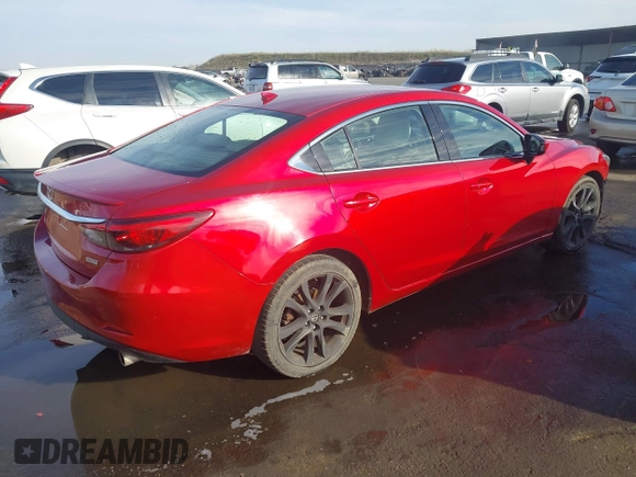 2016 Mazda 6 i Grand Touring with VIN JM1GJ1W57G1438524, listed as a IAAI auction lot 41365211 with 162,678 mi miles and . Bid and sale history available at DreamBid. Image 4.