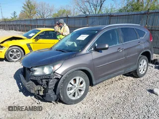 2012 Honda CR-V EX-L with VIN 5J6RM4H79CL014349, listed as a IAAI auction lot 42028523 with 118,571 mi miles. Bid and sale history available at carsss.com. Image 2.