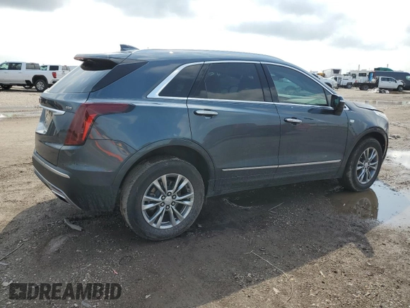 2021 Cadillac XT5 FWD Premium Luxury with VIN 1GYKNCRSXMZ118083, listed as a Copart auction lot 54703225 with 45,973 mi miles and Salvage Title. Bid and sale history available at carsss.com. Image 3.