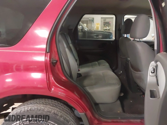 2005 Ford Escape XLT with VIN 1FMYU03115KA75972, listed as a IAAI auction lot 42058791 with 205,005 mi miles and . Bid and sale history available at DreamBid. Image 8.