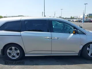2012 Honda Odyssey Touring с VIN 5FNRL5H91CB004546, выставлен на аукционе IAAI как лот 42175002 с пробегом 118 719 миль миль и . История ставок и продаж доступна на DreamBid. Изображение 13.