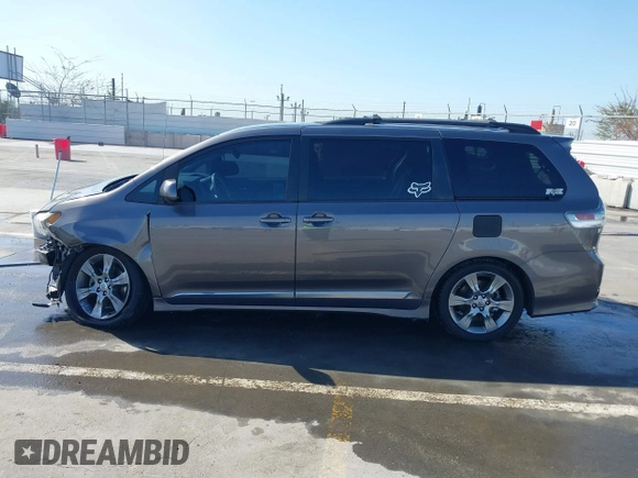 2012 Toyota Sienna SE with VIN 5TDXK3DCXCS233593, listed as a IAAI auction lot 41959611 with 85,558 mi miles. Bid and sale history available at carsss.com. Image 15.