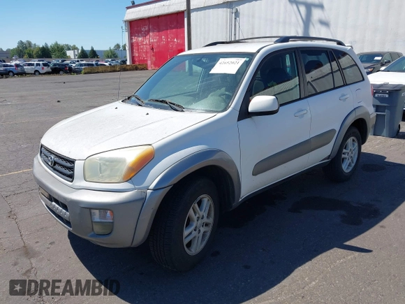 2001 Toyota RAV4 with VIN JTEGH20V610012097, listed as a IAAI auction lot 42652021 with 168,152 mi miles and . Bid and sale history available at DreamBid. Image 2.