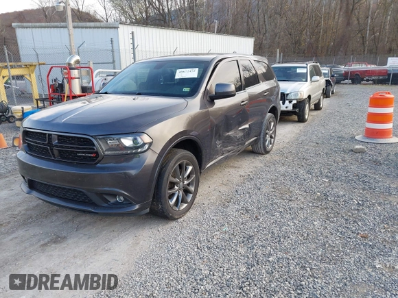 2015 Dodge Durango SXT with VIN 1C4RDJAG4FC784865, listed as a IAAI auction lot 40872452 with 145,877 mi miles and . Bid and sale history available at carsss.com. Image 17.