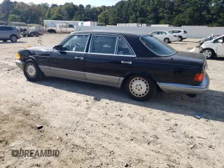 1987 Mercedes-Benz 560 with VIN WDBCA39D3HA355282, listed as a Copart auction lot 74798524 with 200,535 mi miles and Salvage Title. Bid and sale history available at DreamBid. Image 2.