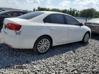 2011 Volkswagen Jetta SEL z VIN 3VWLX7AJ2BM351398, wystawiony jako Copart lot #57559365 z przebiegiem 183 376 mil mil oraz Czysty tytuł • Clean title. Historia ofert i sprzedaży dostępna na DreamBid. Obrazek 3.