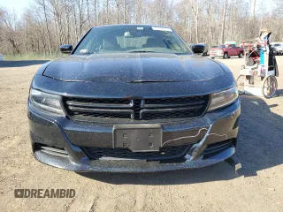 2015 Dodge Charger SE with VIN 2C3CDXBGXFH870769, listed as a Copart auction lot 53486975 with 102,323 mi miles and Salvage Title. Bid and sale history available at carsss.com. Image 5.