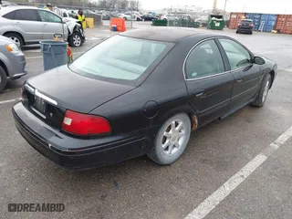 2003 Mercury Sable GS with VIN 1MEFM50203A615030, listed as a IAAI auction lot 41841794 with 226,844 mi miles. Bid and sale history available at carsss.com. Image 4.