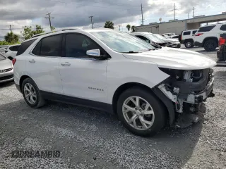 2020 Chevrolet Equinox Premier z VIN 3GNAXNEV8LS732026, wystawiony jako Copart lot #56338425 z przebiegiem 67 904 mil mil oraz Nie do naprawy • Non repairable. Historia ofert i sprzedaży dostępna na DreamBid. Obrazek 4.