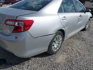 2014 Toyota Camry L with VIN 4T1BF1FK3EU301041, listed as a IAAI auction lot 41858386 with 136,998 mi miles and . Bid and sale history available at DreamBid. Image 19.