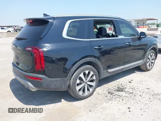 2022 Kia Telluride S with VIN 5XYP64HC1NG227783, listed as a IAAI auction lot 41897694 with 95,713 mi miles and . Bid and sale history available at DreamBid. Image 4.