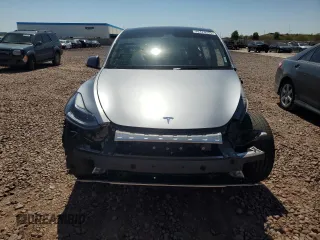 2024 Tesla Model Y Long Range z VIN 7SAYGDEE6RA322800, wystawiony jako Copart lot #49470595 z przebiegiem 16 372 mil mil oraz Szkoda całkowita • Salvage title. Historia ofert i sprzedaży dostępna na DreamBid. Obrazek 5.