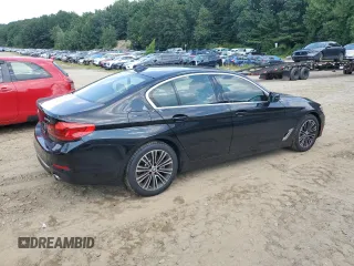 2020 BMW 5 Series with VIN WBAJB1C03LCD19170, listed as a Copart auction lot 64942594 with 66,584 mi miles and Salvage title. Bid and sale history available at DreamBid. Image 3.