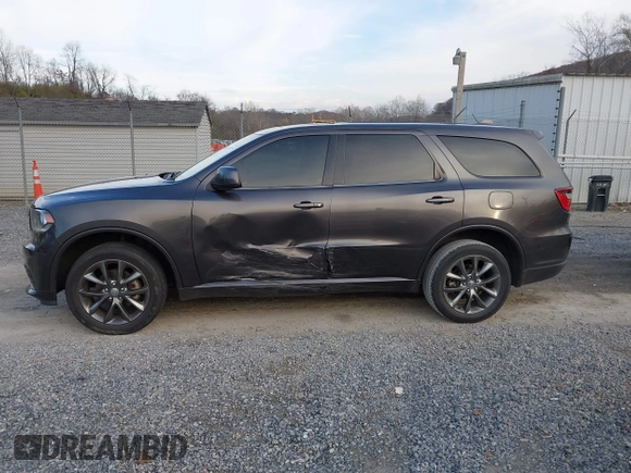 2015 Dodge Durango SXT with VIN 1C4RDJAG4FC784865, listed as a IAAI auction lot 40872452 with 145,877 mi miles and . Bid and sale history available at carsss.com. Image 14.