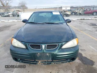 2002 Pontiac Grand Am SE1 with VIN 1G2NF52FX2C165546, listed as a IAAI auction lot 41290065 with 149,834 mi miles. Bid and sale history available at carsss.com. Image 11.