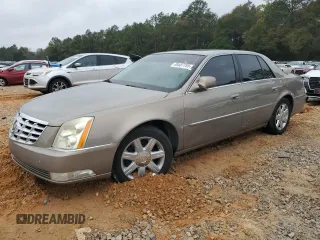 2007 Cadillac DTS V8 z VIN 1G6KD57Y47U115566, wystawiony jako Copart lot #88487785 z przebiegiem 93 484 mil mil oraz Szkody całkowita. Historia ofert i sprzedaży dostępna na DreamBid. Obrazek 1.