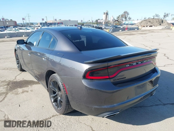 2016 Dodge Charger SXT with VIN 2C3CDXHG6GH327461, listed as a IAAI auction lot 41955412 with 124,775 mi miles and . Bid and sale history available at carsss.com. Image 3.