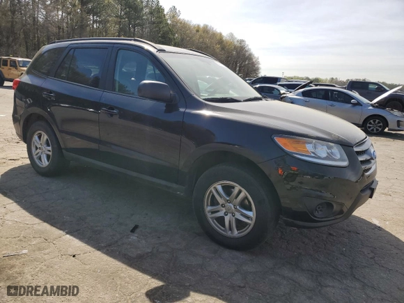 2012 Hyundai Santa Fe GLS with VIN 5XYZGDAB2CG169297, listed as a Copart auction lot 50874585 with 139,344 mi miles and Salvage Title. Bid and sale history available at carsss.com. Image 4.